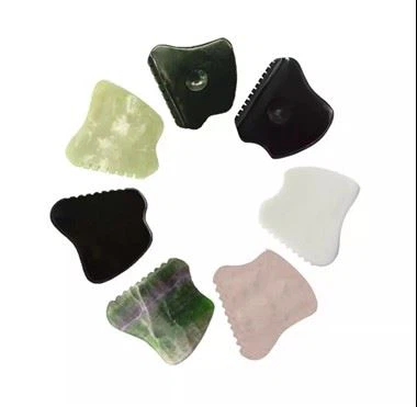 Gua sha jade terapija z masažnimi orodji